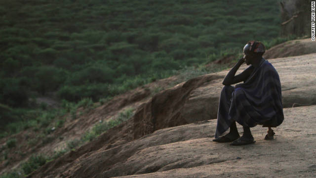 At dawn, one of the Kara village elders sits on his stool overlooking the Omo River Valley, a remote part of Ethiopia. 