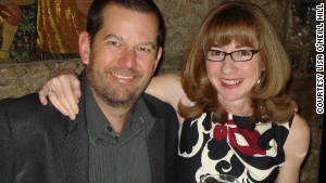 Lisa O\'Neill Hill and her husband, Toby, pose for a photo at a dinner in 2011. 