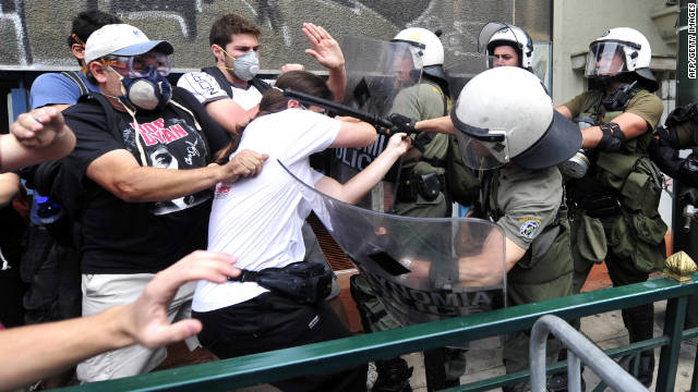Protesters in Athens, Greece, clash with riot police during a 48-hour general strike in June.