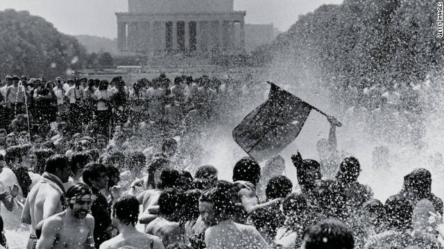 Young people demonstrating against the Vietnam War splash in the Reflecting Pool in front of the Lincoln Memorial in May 1970.