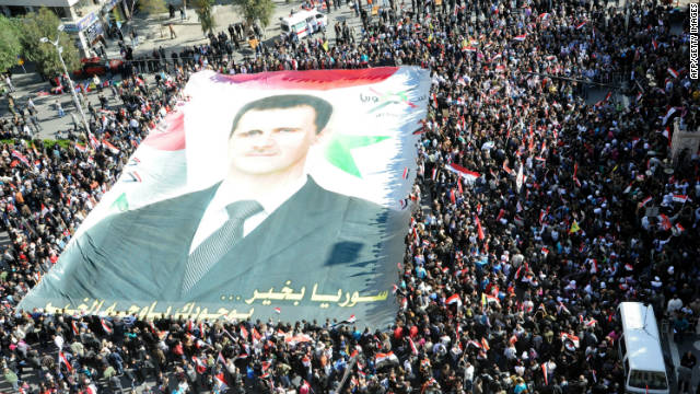 Supporters of Syrian President Bashar al-Assad rally in Damascus on ...