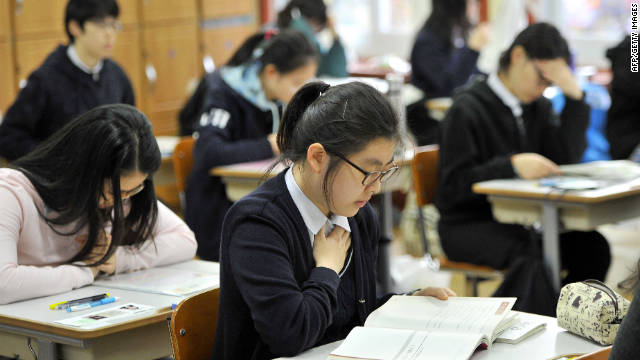 File photo: South Korean students prepare to take a standardized college entrance exam in Seoul on November 10, 2011. 