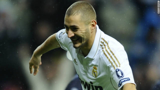 Karim Benzema celebrates a goal during is side's rout of Dinamo Zagreb in the Bernabeu.