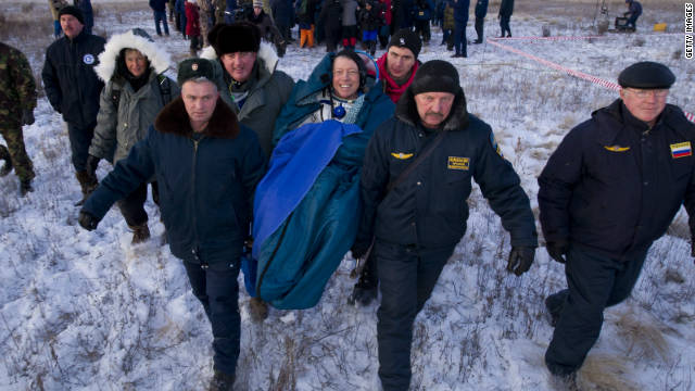 Three astronauts return safely to Earth