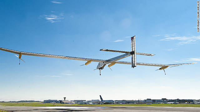 The world's first solar airplane, Solar Impulse, flies into the airshow from Brussels after a 16-hour journey. 