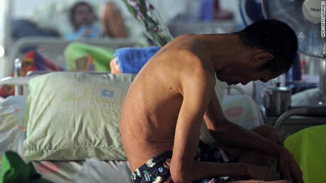 Patients live with HIV/AIDS at a medical facility in a Buddhist temple near Bangkok. World AIDS Day is Thursday.