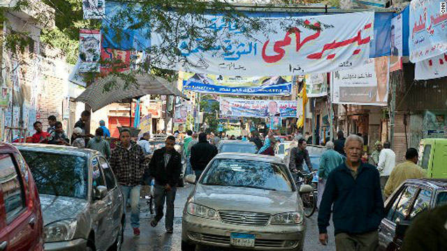 Egyptians await results of parliamentary elections, the first since President Mubarak was overthrown in February.