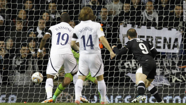 Dimitrios Salpigidis scores PAOK Salonika's opening goal in their shock 2-1 Europa League victory at Tottenham.