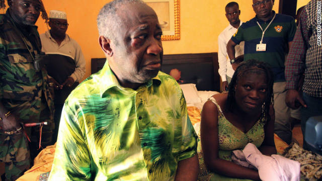 A photo taken on April 11 shows Ivory Coast strongman Laurent Gbagbo and his wife Simone after their arrest. 