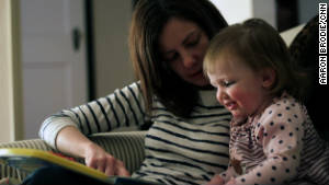 Rosenblatt\'s wife, Alexandra, and their daughter, Harper, read a book together. 