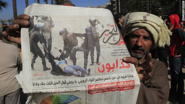 http://i2.cdn.turner.com/cnn/dam/assets/111218115620-egypt-newspaper-woman-beaten-story-top.jpg