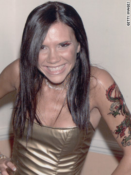 Victoria Beckham, better known as Posh Spice when this photo was snapped in 1998, once sported a temporary dragon tattoo on her arm.