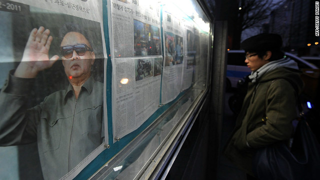 A man in Seoul on December 20, 2011 reads a newspaper announcing the death of North Korean leader Kim Jong Il.