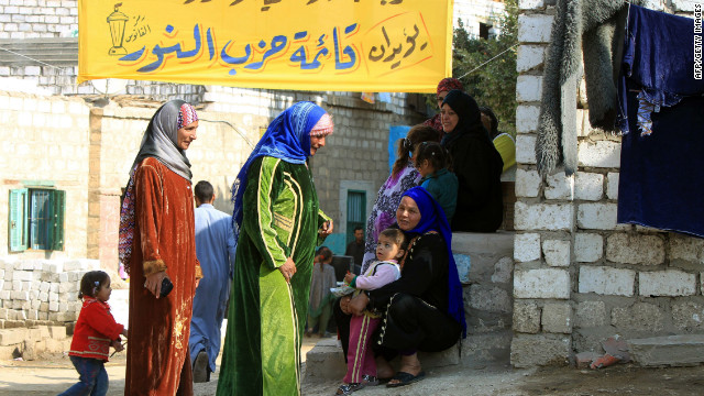 Egyptian women gather near a polling station in Minya, during the final round of parliamentary elections on January 3, 2012. 