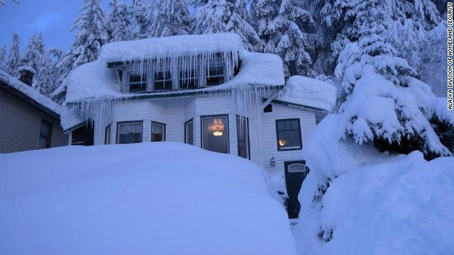 Alaska town digging its way out after record 18 feet of snow