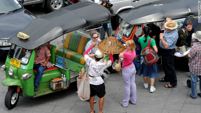 Tourists visit a Buddhist temple in Bangkok. The U.S. has warned of possible terrorist attacks in the busy tourist areas of the city.