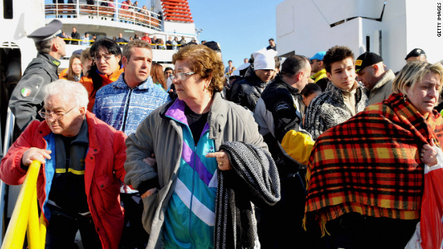 On Saturday, January 14, crowds prepare to leave the island of Giglio, where passengers were staying after the ship ran aground.