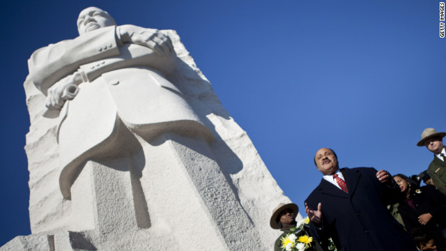 Marin Luther King III speaks at the base of a statue of his father after a wreath-laying ceremony Sunday in Washington.