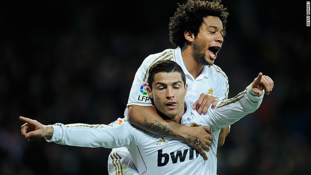 Cristiano Ronaldo celebrates with Marcelo after scoring Real Madrid's second goal against Real Zaragoza 