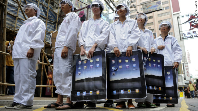 People stage a protest against Foxconn, which manufactures Apple products in mainland China, in May 2011 in Hong Kong. 