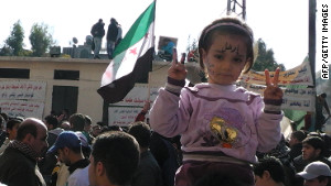 A Syrian girl gestures during a protest in the flashpoint city of Homs on Friday. 