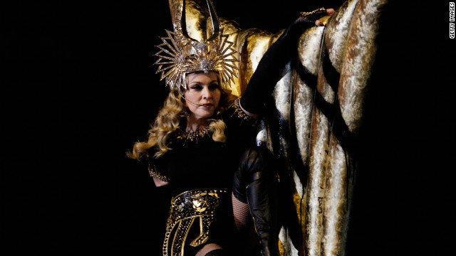 <br/>Madonna's started her performance dressed as a Roman goddess clad in black and gold.