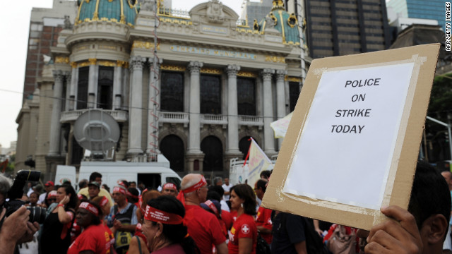 Police and firefighters protest in the historic center of Rio de Janeiro on Thursday.