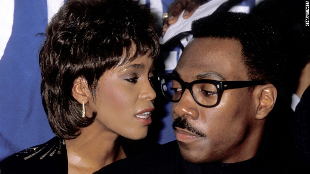 Houston and comedian/actor Eddie Murphy attend the United Negro College Fund's 10th annual Lou Rawls Parade of Stars telethon kickoff party in November 1989 in Beverly Hills, California. 