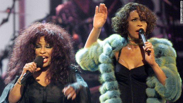 Chaka Khan, left, and Houston perform during the VH1broadcast concert "Divas Live 99" at New York's Beacon Theater in 1999. The benefit concert supported VH1's "Save the Music" program that funds music education in public schools around the country.