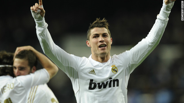 Cristiano Ronado celebrates on his way to a hat-trick in the Santiago Bernabeu stadium.