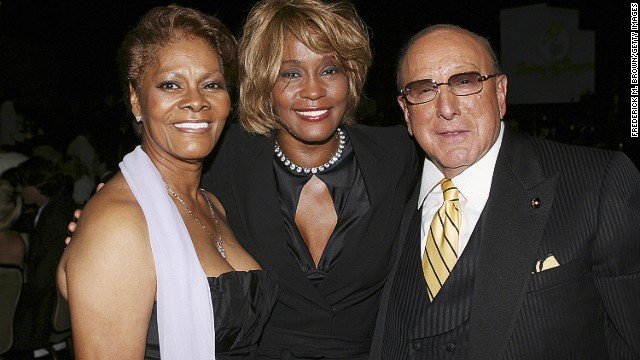 <br/>Houston poses with her cousin Dionne Warwick and producer Clive Davis during the15th annual Ella Awards in Beverly Hills, California, in September 2006. 