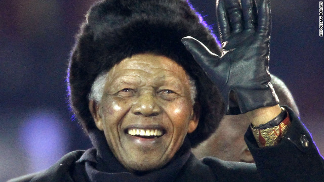 Former South African president Nelson Mandela waves at the crowd during a World Cup match in 2010.