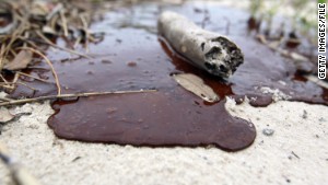 Thick oil washes ashore from the Deepwater Horizon oil spill in the Gulf of Mexico in July 2010 in Gulfport, Mississippi. 