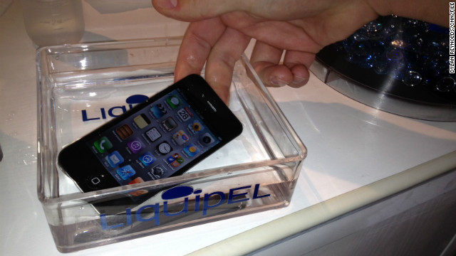 <br/>An iPhone waterproofed using a substance called Liquipel is submerged at the 2012 Mobile World Congress in Barcelona.
