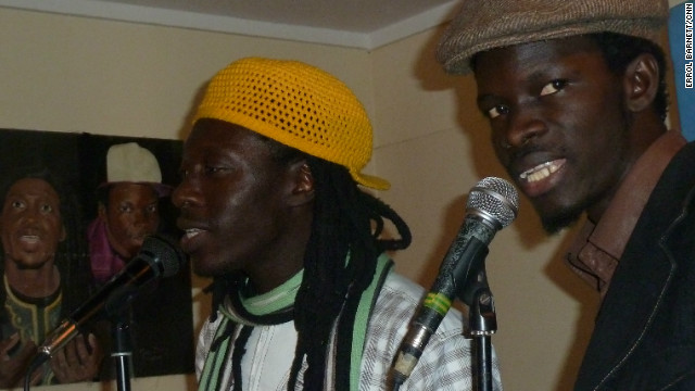 <br/>Daara J Family vocalists Faada Freddy (left) and N'Dongo D (right) in the studio.