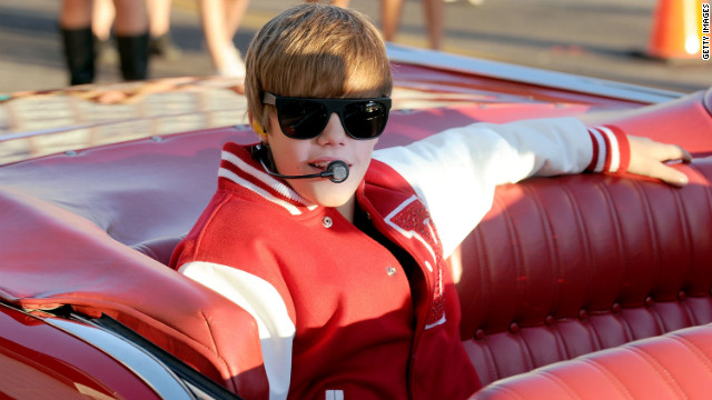 <br/>Complete with a letterman jacket and a drum solo, Bieber surprises fans in an outdoor performance at the MTV Video Music Awards in Los Angeles in September 2010.