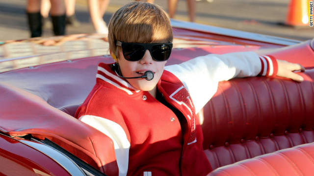 Complete with a letterman jacket and a drum solo, Bieber surprises fans in an outdoor performance at the MTV Video Music Awards in Los Angeles in September 2010.