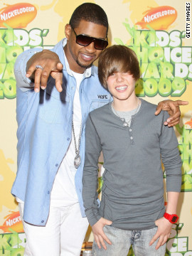 <br/>Bieber attends Nickelodeon's Kids' Choice Awards in March 2009 with his mentor Usher.