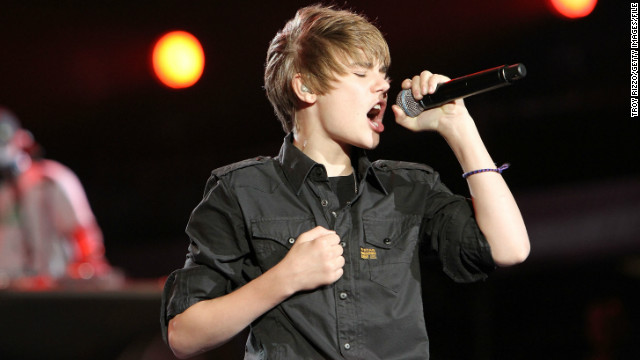 By early 2010, Bieber had notched a chart-scaling album with "My World" and was ready to release "My World 2.0," which contained the single "Baby." Here, Bieber performs at the Pepsi Super Bowl Fan Jam in Miami Beach in February 2010.