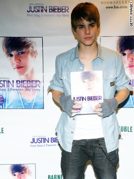 <br/>Bieber, then 16, promotes "First Step 2 Forever: My Story" at a bookstore in New York in November 2010.