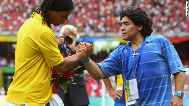 Brazil star Ronaldinho greets Argentina great Diego Maradona after receiving his bronze medal at the 2008 Beijing Olympics. The former Barcelona star has been included as an overage player in Brazil's provisional squad for London 2012.