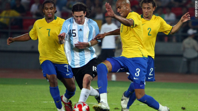 Anderson, left, and his Brazil teammates try to take the ball off Lionel Messi in the 2008 Olympic semifinal against Argentina, who won 3-0 and went on to take gold.