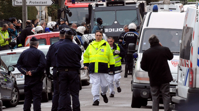 Two police officers were injured in the raid, Interior Minister Claude Gueant said. Merah had said he wanted to "die with weapons in his hands.<br/><br/>