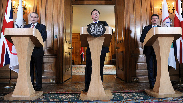 UK Prime Minister David Cameron (center) has asserted Syrian athletes will be in attendance at the London Olympics