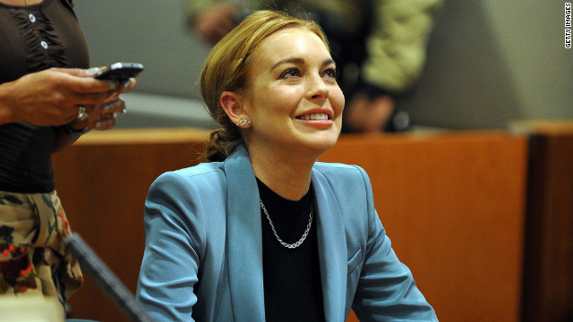 Lindsay Lohan attends her probation hearing at the Airport Courthouse in March 2012 in Los Angeles. Superior Court Judge Stephanie Sautner decided to take Lohan off probation from a 2007 drunken driving case and said that she will no longer have to meet with a probation officer or appear in court on her 2011 shoplifting case, as long as she obeys all laws through May 2014.