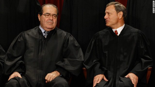 Supreme Court Associate Justice Antonin Scalia, left, and Chief Justice John Roberts are expected to vote against the mandate.