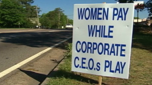 A sign protesting Augusta National Golf Club\'s no-women policy in 2002.