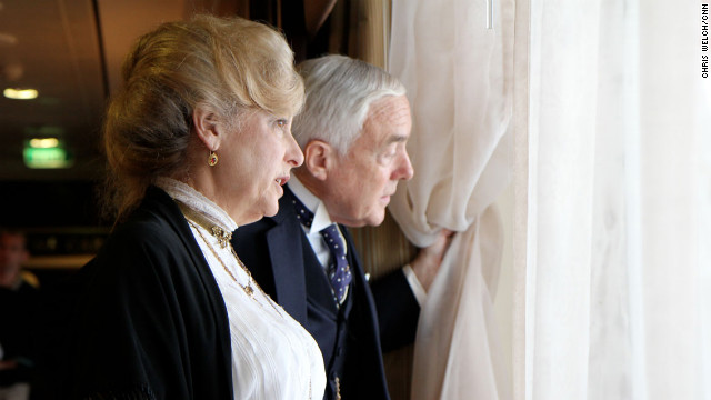 Byron and Judy Matson of Missouri peer out a window aboard the ship.