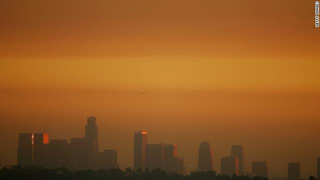 The downtown skyline of Los Angeles is enveloped in smog shortly before sunset. Ozone is a major component of smog. 