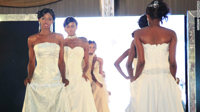 Models wear bridal gowns on the runway at the recent Lagos's Wed Expo wedding exhibition. Organizers say about 10,000 people attended over two days.